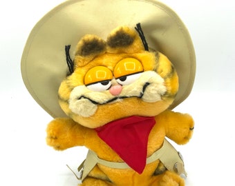 Gorgeous  collectible and vintage  Garfield as a cowboy cat,push toy, cat, orange, bandanna, hat, chaps.