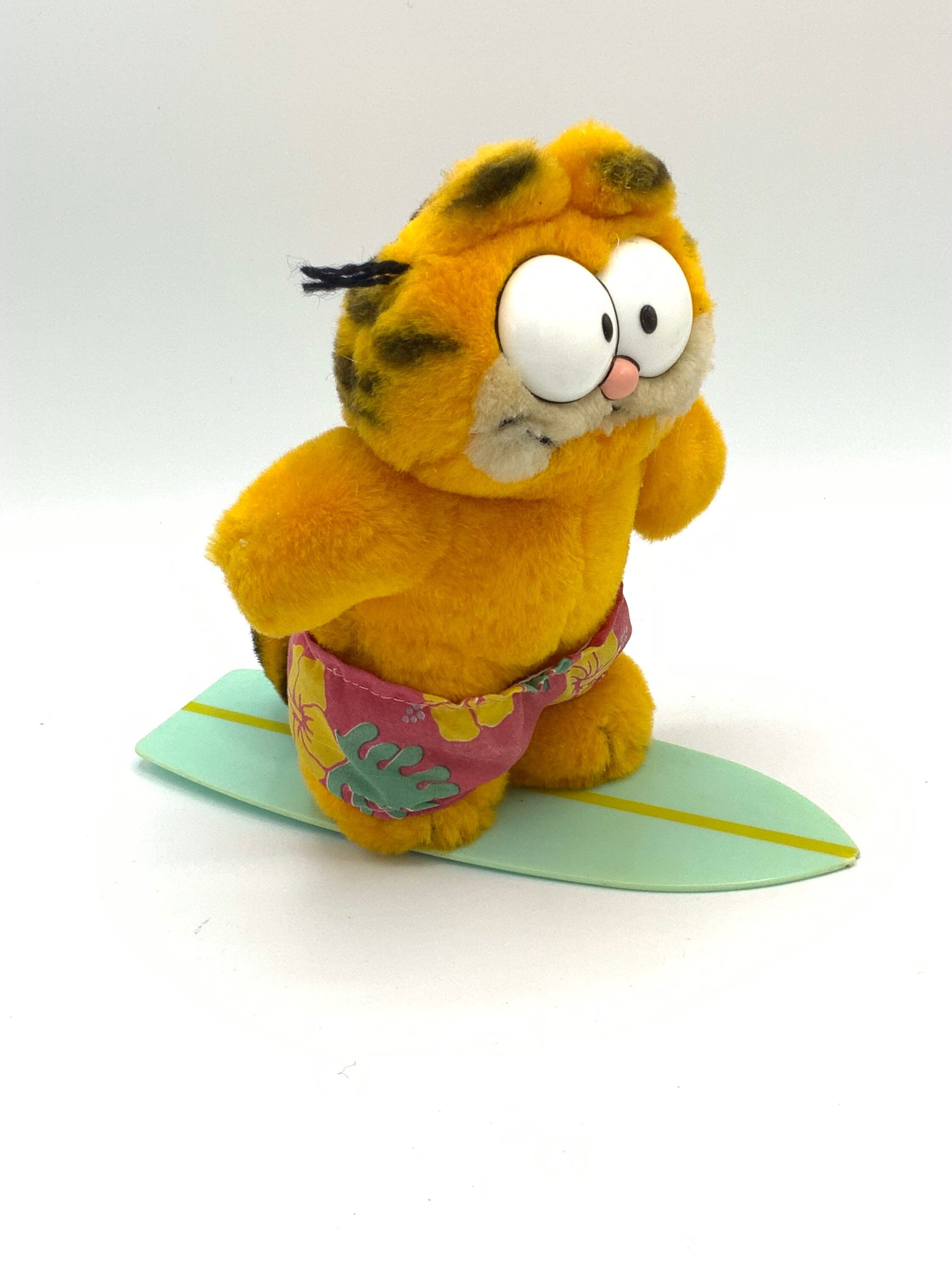 Gorgeous collectible and vintage Hawaiian Garfield with surf board