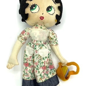 Gorgeous collectible and vintage Betty Boop stuffed doll with long dress.