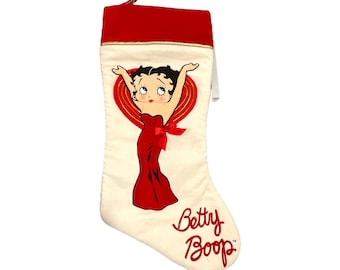 Gorgeous collectible and vintage Betty Boop with red dress, stocking.