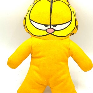 Gorgeous collectible and vintage Garfield stuffed animal, cat, orange.
