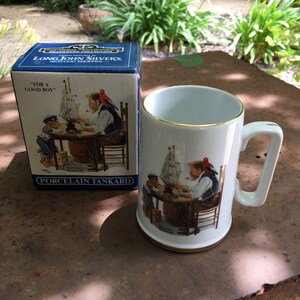Vintage Norman Rockwell Tankard from the Seafarers Collection” For a Good Boy” Tankard/White porcelain and trimmed in 24-karat gold
