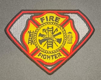 May include: A red, black and yellow embroidered patch with a firefighter's helmet, axe and ladder inside a circle. The words "FIRE FIGHTER" are written on the patch.