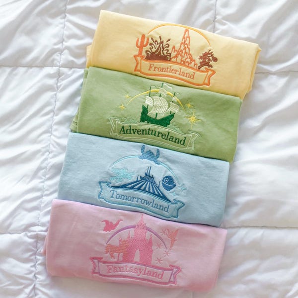 The Lands Collection | Adventure, Frontier, Fantasy, & Tomorrow | Embroidered Comfort Colors/Gildan Tee