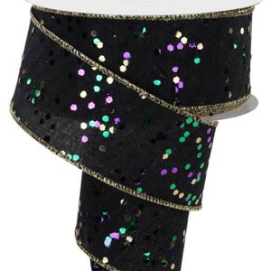 May include: Black wired ribbon with gold, green, and purple confetti.