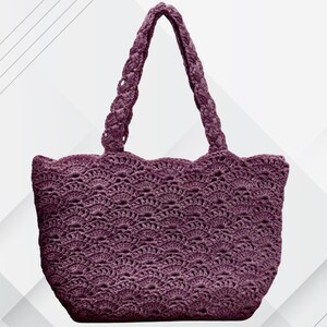 May include: A crocheted tote bag in a deep purple hue. The bag features a scalloped top edge and braided handles. The body of the bag has a detailed openwork pattern, creating a textured appearance. This handmade bag is suitable for carrying various items.