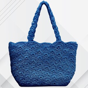 May include: A blue crochet tote bag with a scalloped top edge and braided handles. The bag features an openwork design, showcasing the intricate details of the crochet. The bag is a solid blue color and is suitable for carrying various items.