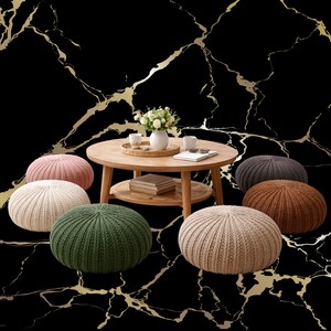 May include: A set of three ceramic mugs with a speckled, matte finish. The mugs are in shades of cream, light gray, and dark gray. Each mug has a simple, minimalist design, perfect for coffee or tea.