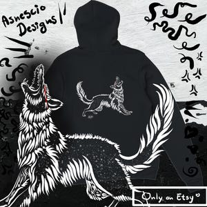 May include: Black hoodie with a white wolf design on the front and back. The hoodie has a hood and long sleeves. The text "Asnescio Designs" is at the top left. The text "Only on Etsy" is at the bottom right.