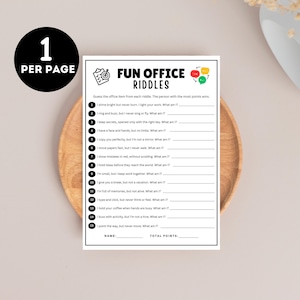 May include: A white paper with the text "FUN OFFICE RIDDLES" and a list of riddles. The paper is on a wooden plate with a black circle that says "1 PER PAGE". The riddles are designed for office fun.