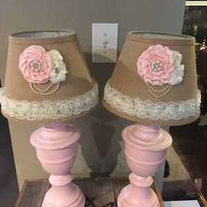 Pair of vintage pink lamps with ribbon and lace