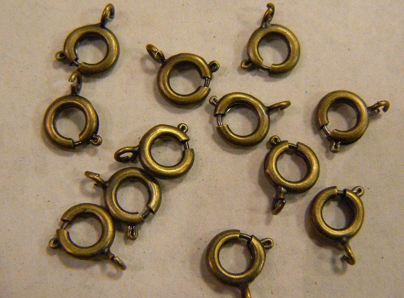 100 pieces Bronze Round spring Clasp 8mm