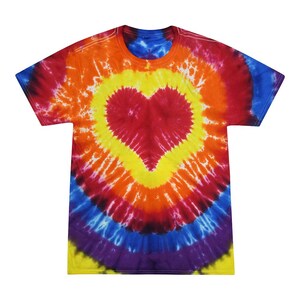 May include: A tie-dye t-shirt with a large red heart in the center. The shirt is a circular pattern of yellow, orange, red, blue, and purple.