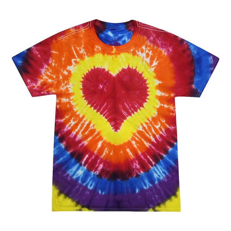 May include: A tie-dye t-shirt with a large red heart in the center. The shirt is a circular pattern of yellow, orange, red, blue, and purple.
