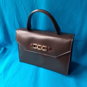 Brown leather EROS vintage 60s bag. Unused vintage.