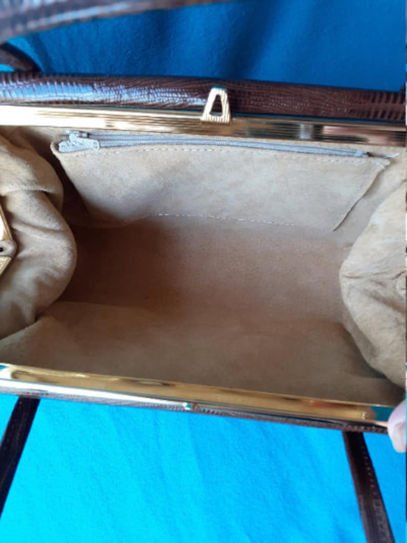 Suede lined. Vintage brown mock croc Kelly style handbag