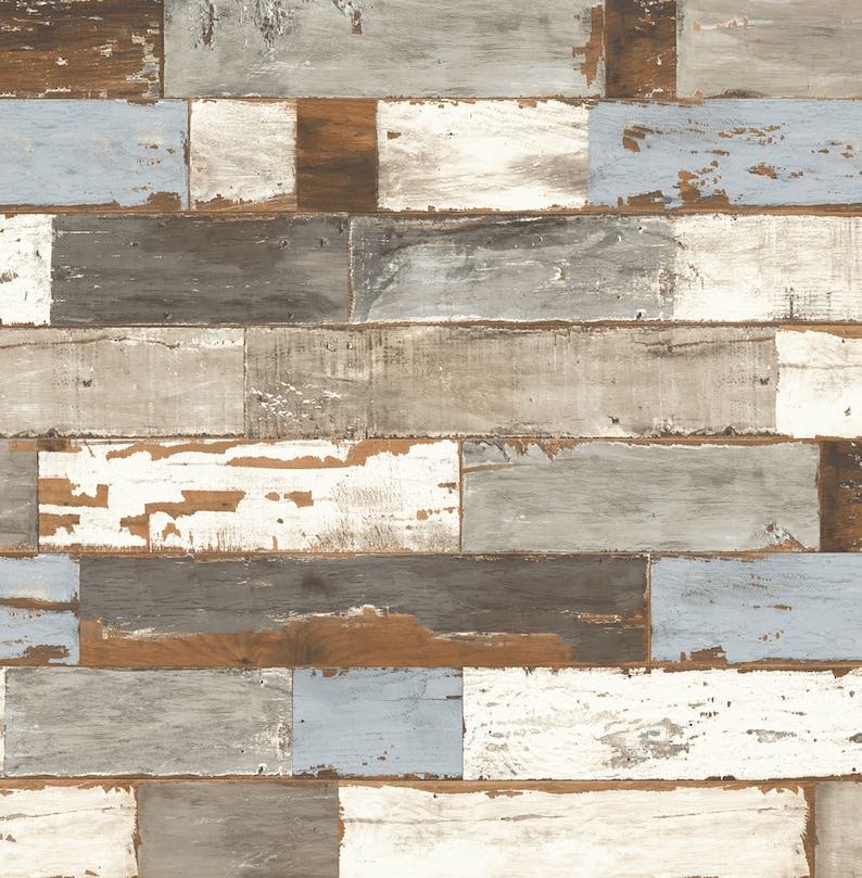 May include: A close-up of a wall made of reclaimed wood planks. The planks are arranged in a horizontal pattern and have a variety of colors, including brown, gray, white, and blue. The wood has a distressed look, with knots, cracks, and faded paint.