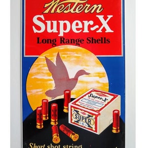 May include: Vintage metal sign advertising Western Super-X Long Range Shells. The sign features a red background with white text and a silhouette of a duck flying over a yellow sun. The sign also includes a box of Super-X shells and several shotgun shells.