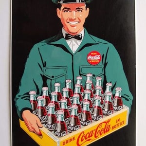 COCA COLA - Delivery Man Holding a (24) bottle Case.