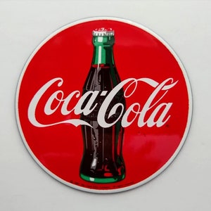 COCA COLA Logo with BOTTLE Behind and Red Background.