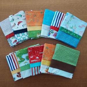 May include: A collection of 10 colorful fabric squares with different patterns and designs. The squares are made of cotton fabric and have a variety of colors, including blue, green, red, yellow, and orange. The squares are arranged in a random order and are all different sizes.