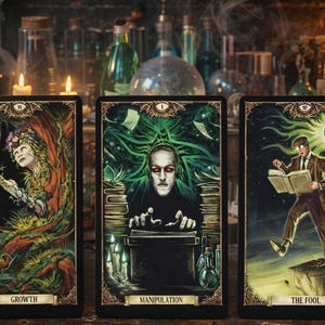 May include: Three tarot cards with detailed illustrations. The cards are labeled "Growth", "Manipulation", and "The Fool". The background includes candles, bottles, and a skull, creating a mystical atmosphere. The cards have a dark, gothic aesthetic.