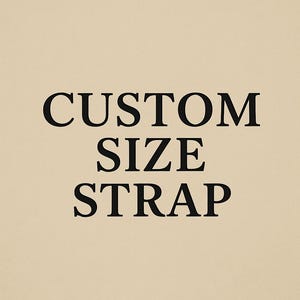 May include: The image displays the words "CUSTOM SIZE STRAP" in a bold, black font. The text is centered on a beige background. The overall design is simple and direct, emphasizing the product's customization.