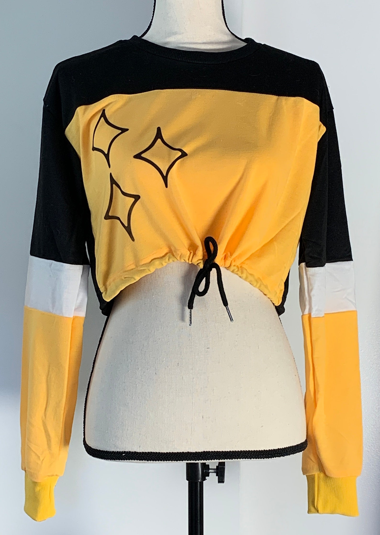 black and gold long sleeve shirt