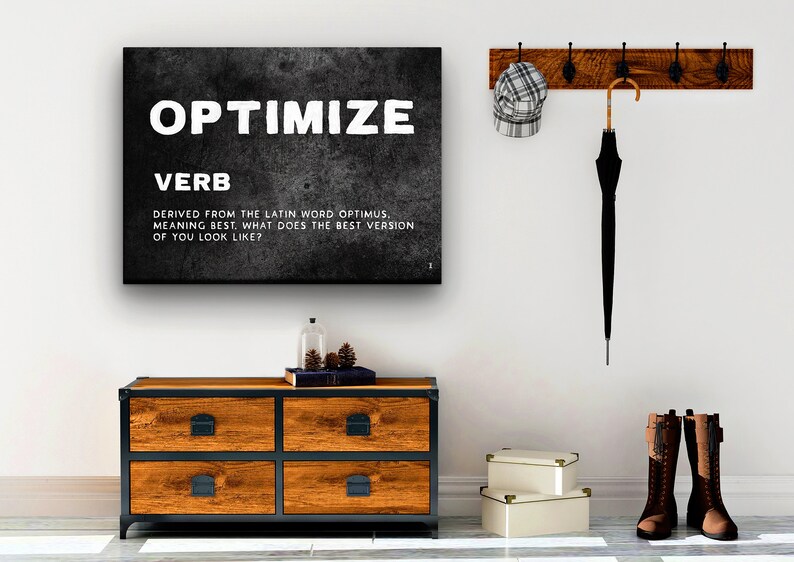 May include: Black and white motivational poster with the word "OPTIMIZE" in large white letters. The word "VERB" is below the word "OPTIMIZE" in smaller white letters. The text below the word "VERB" reads "Derived from the Latin word optimus, meaning best. What does the best version of you look like?"