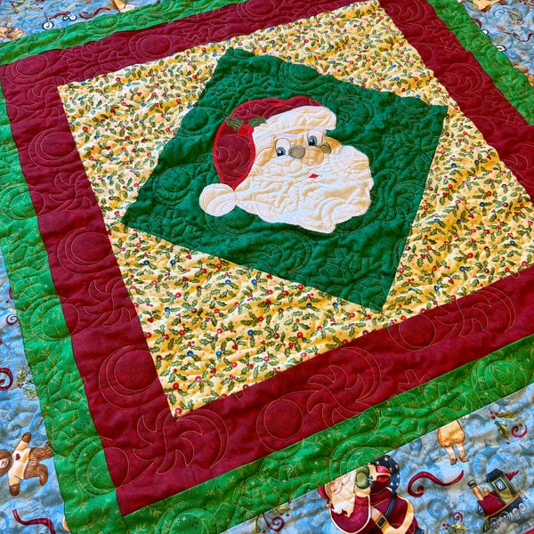 Child’s minky backed Santa Christmas quilt