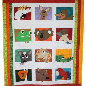 May include: A colourful quilt featuring a range of Australian animals, including a koala, kangaroo, crocodile, and kookaburra. The quilt is made with a variety of fabrics and textures, and is ideal for a child's room.