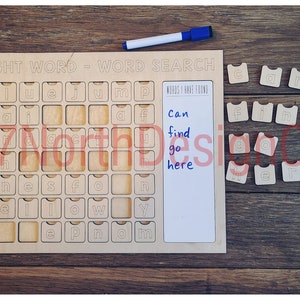May include: A wooden board with a grid of squares containing letters. The letters are arranged to spell out sight words. There is a white board on the right side of the board with the words "Can find go here" written on it. There are also wooden letter tiles that spell out the words "can find go here".