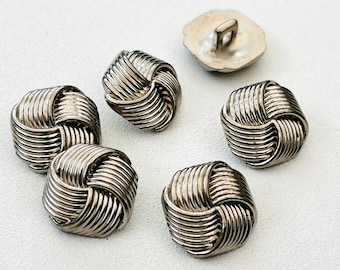 7 x 17mm silver square knot shank buttons. R60