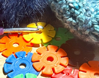 Pompom wheels for easy attaching to hats. Packs of 5 10 or 20