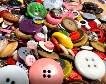 Buttons. Assorted 50g bag resin, plastic. Perfect for knitting, baby toddler cardigans