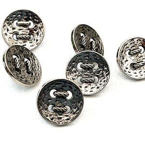 Pack of 7 14 mm (approx) silver shank plastic buttons. Vintage retro style. 17