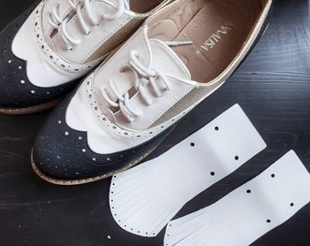 tennis shoes that look like saddle shoes