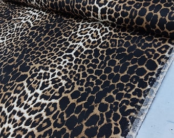 Tessuto leopardato, tessuto con stampa animalier, tela di cotone per arredamento d'interni ed esterni, ideale per tappezzeria, sedie, divani, tende e drappeggi.