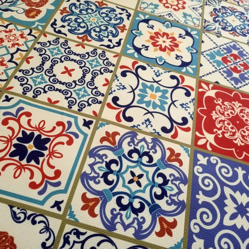 May include: A colorful tile pattern with blue, red, and white geometric designs. The tiles are arranged in a grid pattern and have a vintage look.