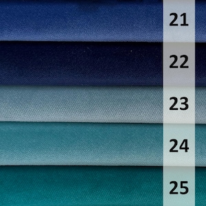 May include: Five fabric swatches in shades of blue and teal, numbered 21 to 25. The fabrics have a soft, velvety texture, with colours ranging from deep navy to a vibrant teal. Ideal for upholstery or textile projects.