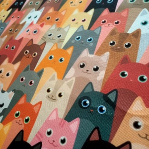 May include: A colorful pattern of cartoon cats with different colored fur and eyes. The cats are arranged in a repeating pattern, with each cat facing forward. The background is a solid color.