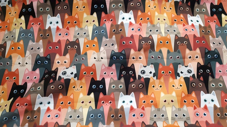 May include: A colorful fabric with a repeating pattern of cartoon cats in various colors and poses. The cats are all looking at the viewer.