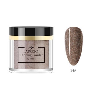 May include: A jar of Jargod dipping powder in a clear glass jar with a black lid. The jar is labeled "Jargod Dipping Powder" and "10g 0.34fl. oz". The powder is a light brown color with a shimmery finish. A sample of the powder is shown on a nail, which is a light brown color with a shimmery finish. The nail is labeled "14#".