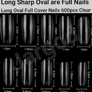 May include: A set of 600 clear, long oval-shaped artificial nails. The nails are arranged in rows and labeled with their length in centimeters. The nails are designed for full nail coverage.
