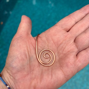 Copper spiral arthritis pain relief & Energy amplifying Palm Cuff with small heart shaped crystal.  Free shipping in USA