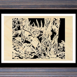 May include: A black and white wood carving of a deer with large antlers standing in a forest setting. The deer is facing to the left and is partially hidden behind a tree trunk. The carving is detailed and intricate, with the deer's fur, antlers, and the surrounding trees all clearly visible.