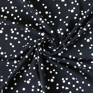 0.5 m jersey cotton jersey snowflakes black