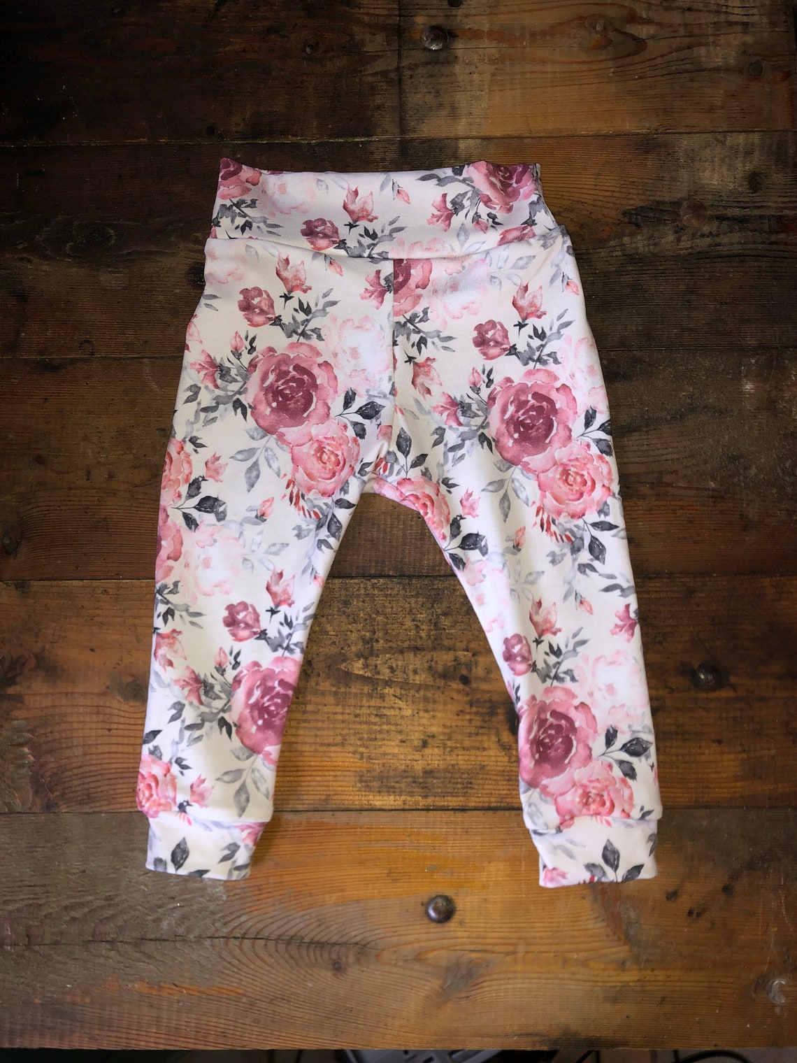 pants with roses on them