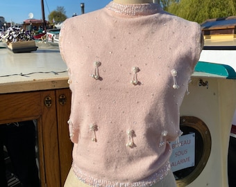 Super cute 1950s pale pink cashmere sweater vest with little dangly pearls