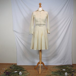 Lovely 1950s cream shirt dress with pleated skirt